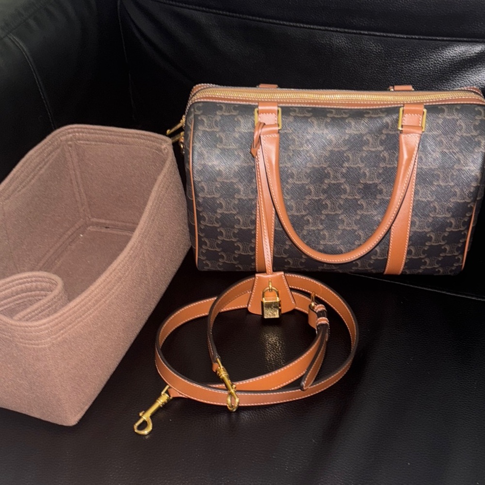 MEDIUM BOSTON IN TRIOMPHE CANVAS AND CALFSKIN